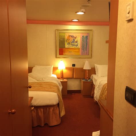 Luxurious Living: The Indulgent Features of the 4 Person Interior Stateroom on the Carnival Magic